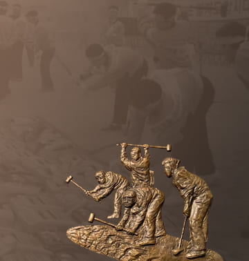 A photo and relief of employees destroying 150,000 defective products with hammers at Samsung Electronics' Gumi Plant in 1995.