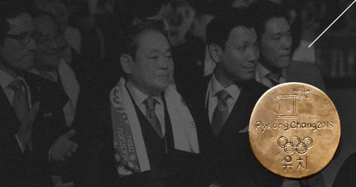 A medal-shaped relief commemorating the Pyeongchang Winter Olympics bid  with a background photo of Chairman Lee Kun-hee looking on as Pyeongchang is announced as the host of the 2018 Winter Olympics.